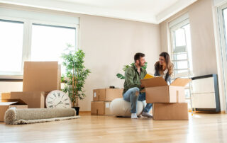 Young couple moving into loft apartment for rent