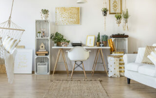 Cute, feminine desk setup in loft style apartment