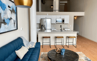 Living room and kitchen area in loft apartments in St. Joseph