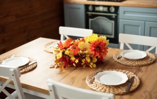 A dining room table set up for Thanksgiving